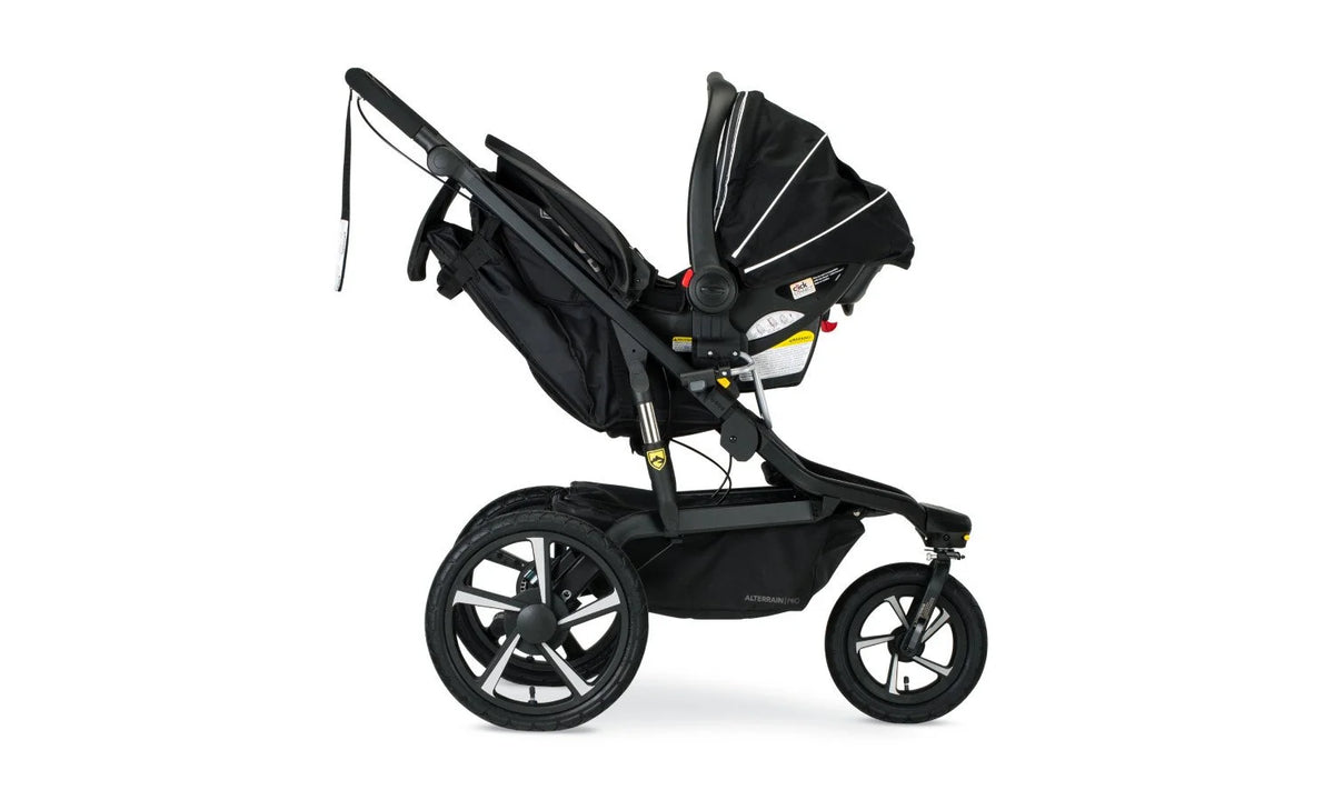 Right Profile View of an Alterrain Pro (Open Canopy) with a graco car seat attached