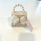 Ce Ce Co Tweed Luxe Pearl Bow Purse - Beige