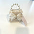 Ce Ce Co Tweed Luxe Pearl Bow Purse - Beige