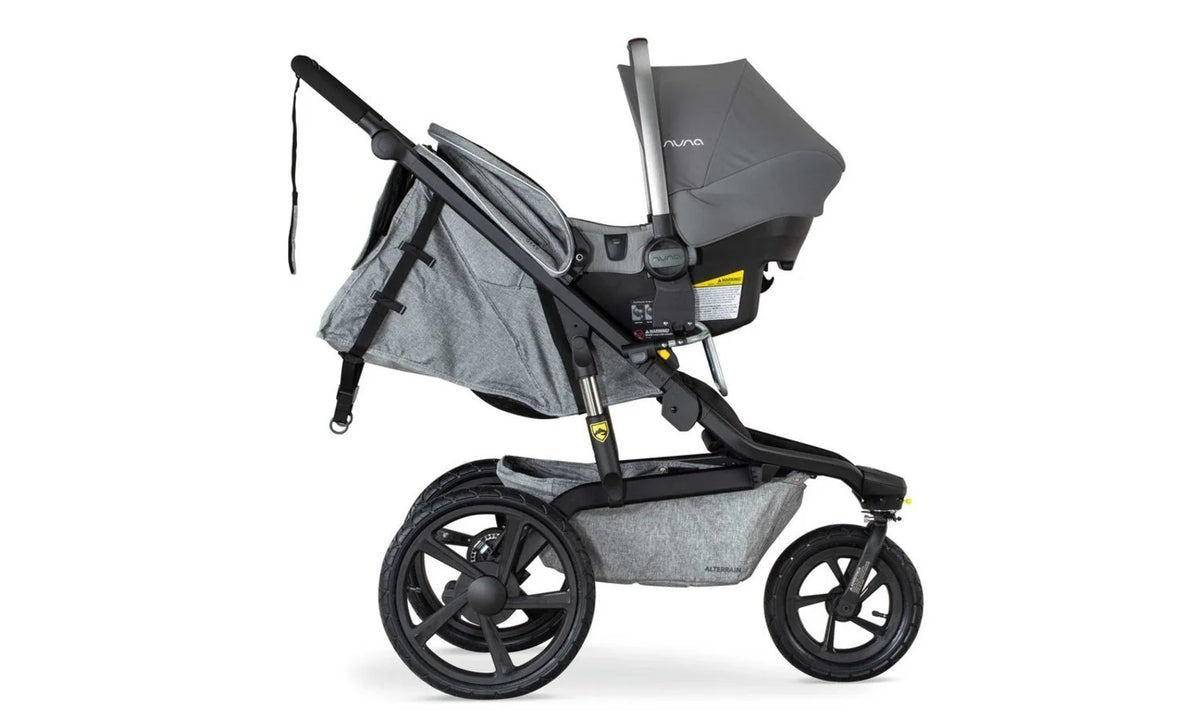 Right Side Profile of NUNA car seat attached to an Alterrain Stroller using an Infant Car Seat Adapter