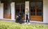 Mother pushing her wayfinder pack travel system with baby inside
