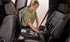 Mother installing the wilder car seat base
