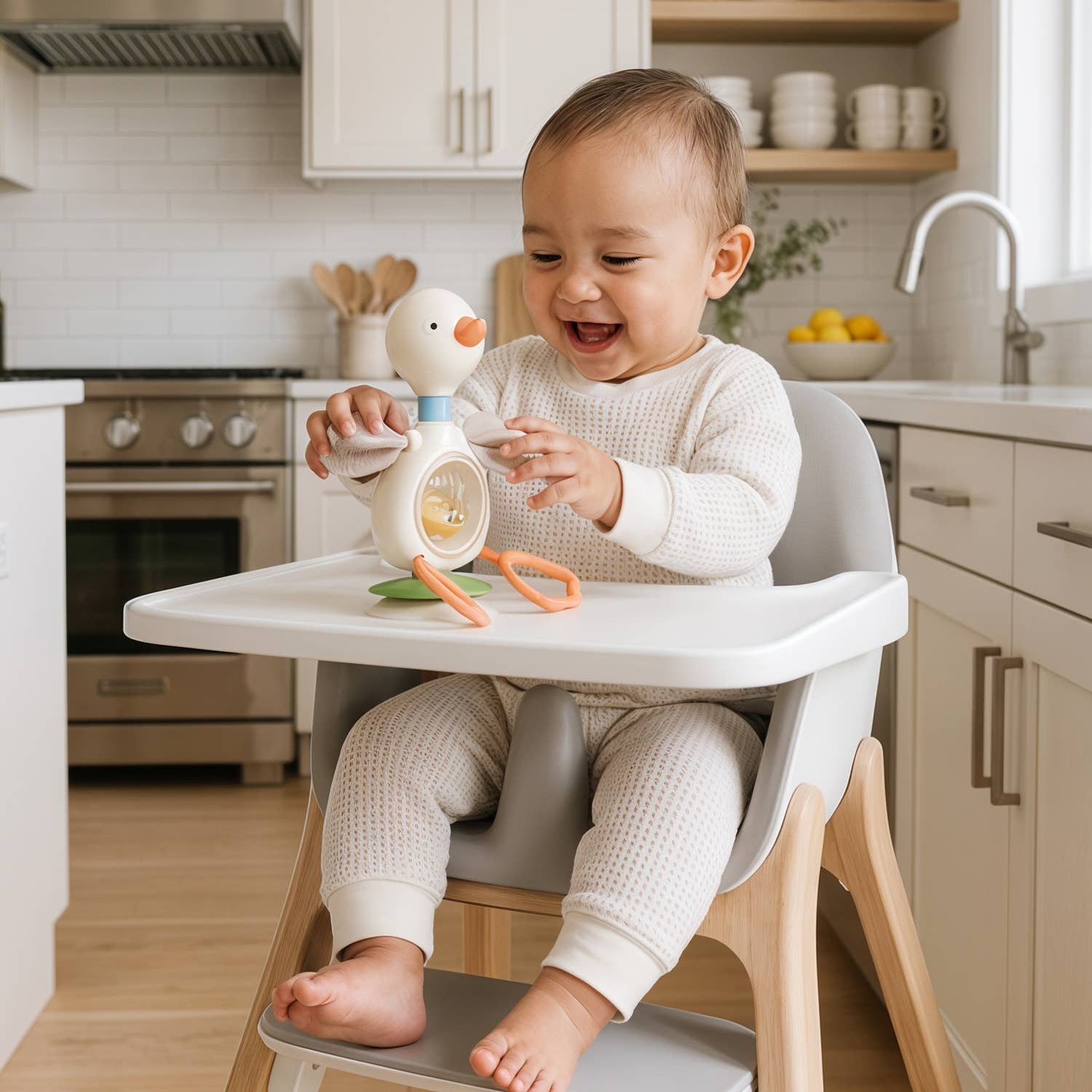 Itzy Ritzy Itzy Twist & Bop™ - High Chair Sensory Toy Goose